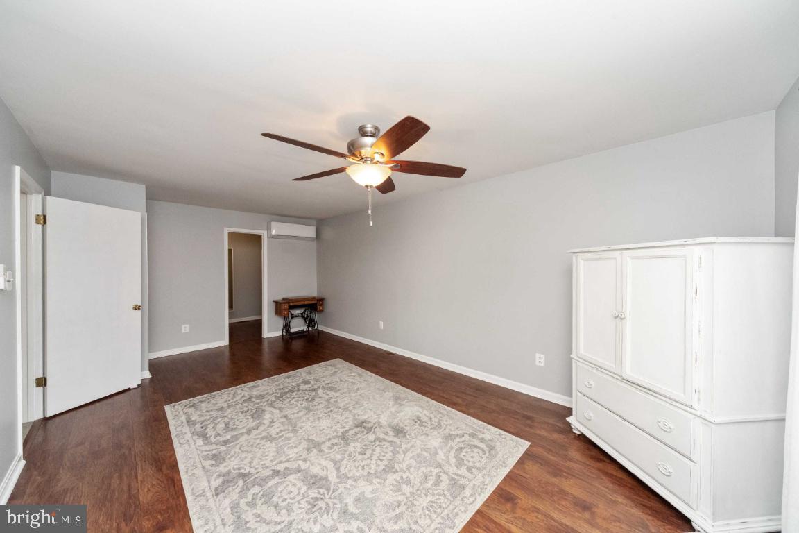 8117 Timberbrooke Road Baltimore, MD 21237 - Photo 16 of 35 Spacious primary bedroom with ensuite bath