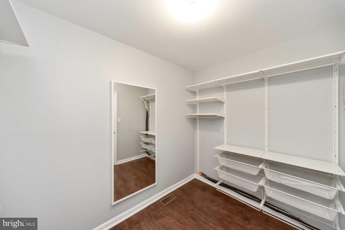8117 Timberbrooke Road Baltimore, MD 21237 - Photo 18 of 35 Huge walk-in closet with shelving!