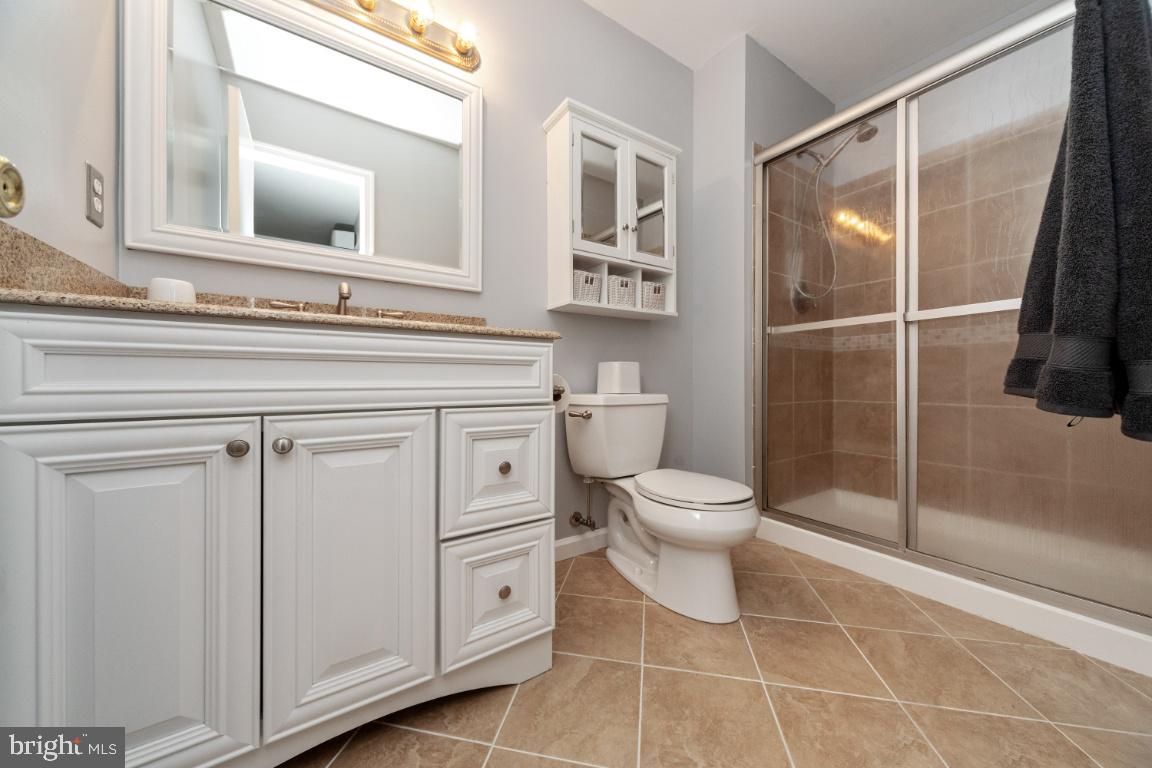 8117 Timberbrooke Road Baltimore, MD 21237 - Photo 19 of 35 Updated bathroom in primary suite