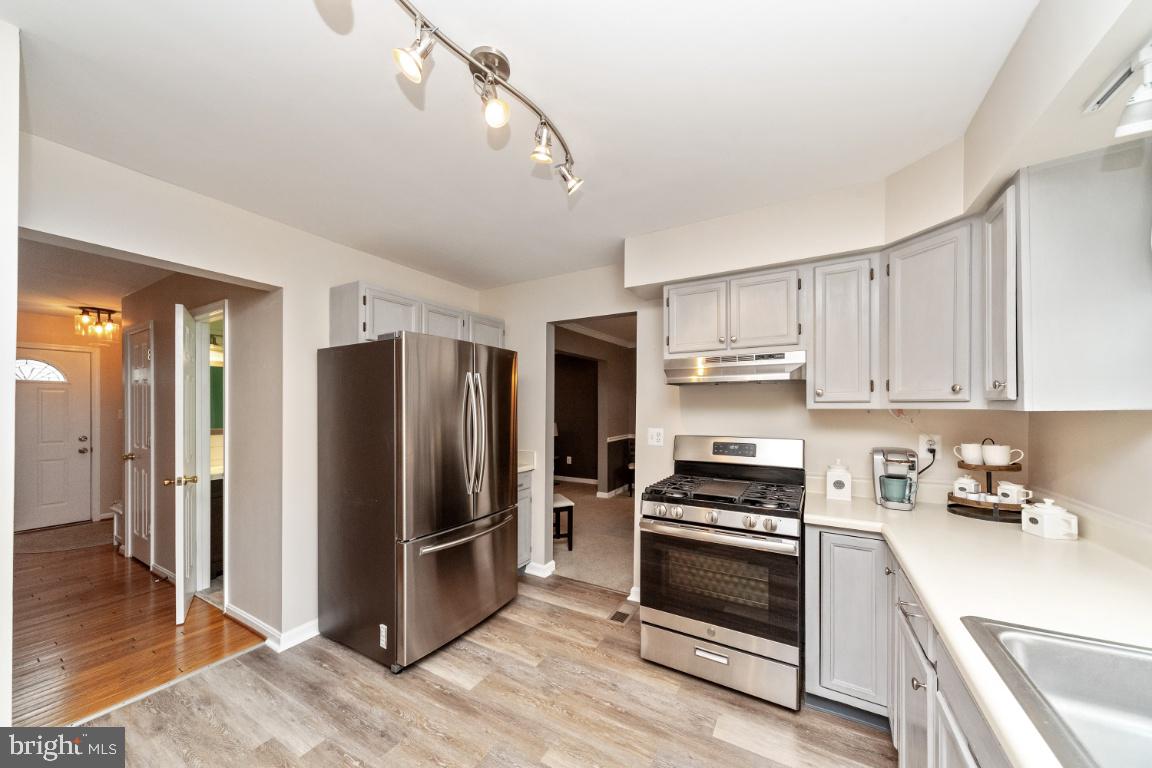 Recent stainless steel appliances and flooring