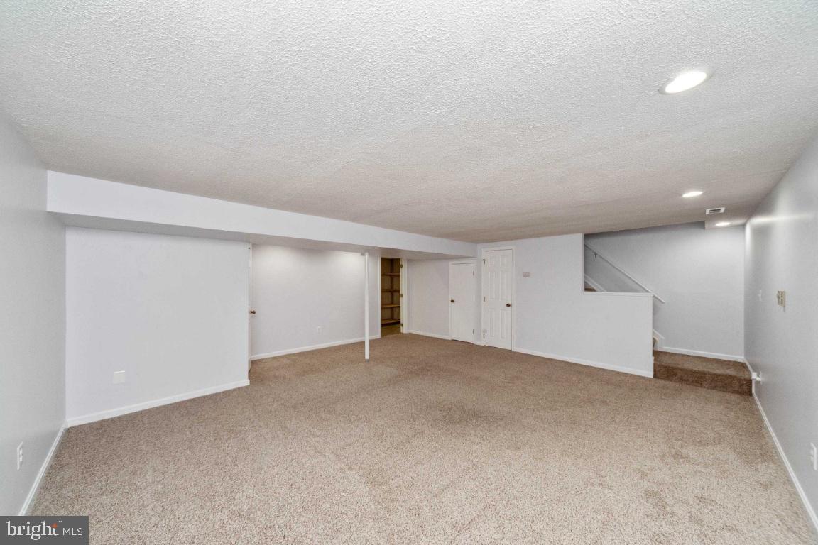 8117 Timberbrooke Road Baltimore, MD 21237 - Photo 29 of 35 Fabulous recreation rooms with neutral colors