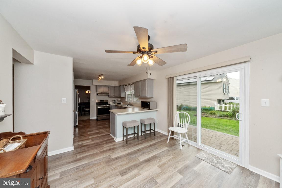 Large dining area with sliders to patio.