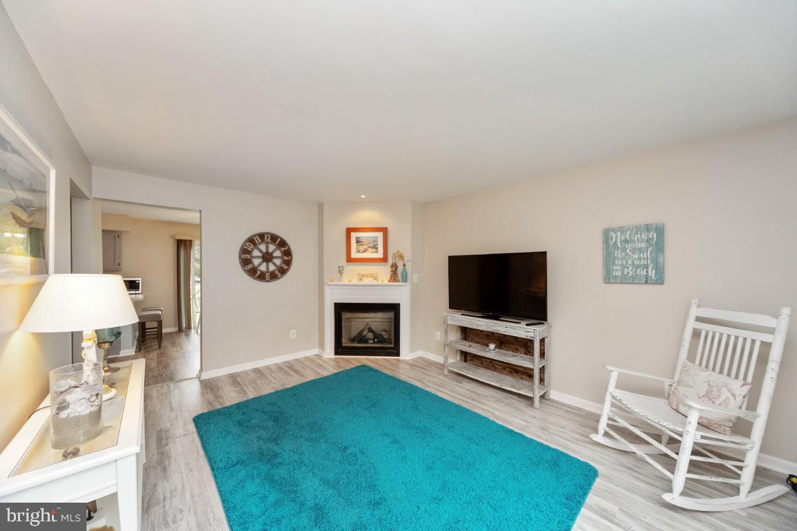 8117 Timberbrooke Road Baltimore, MD 21237 - Photo 8 of 35 First-floor family room with gas fireplace!