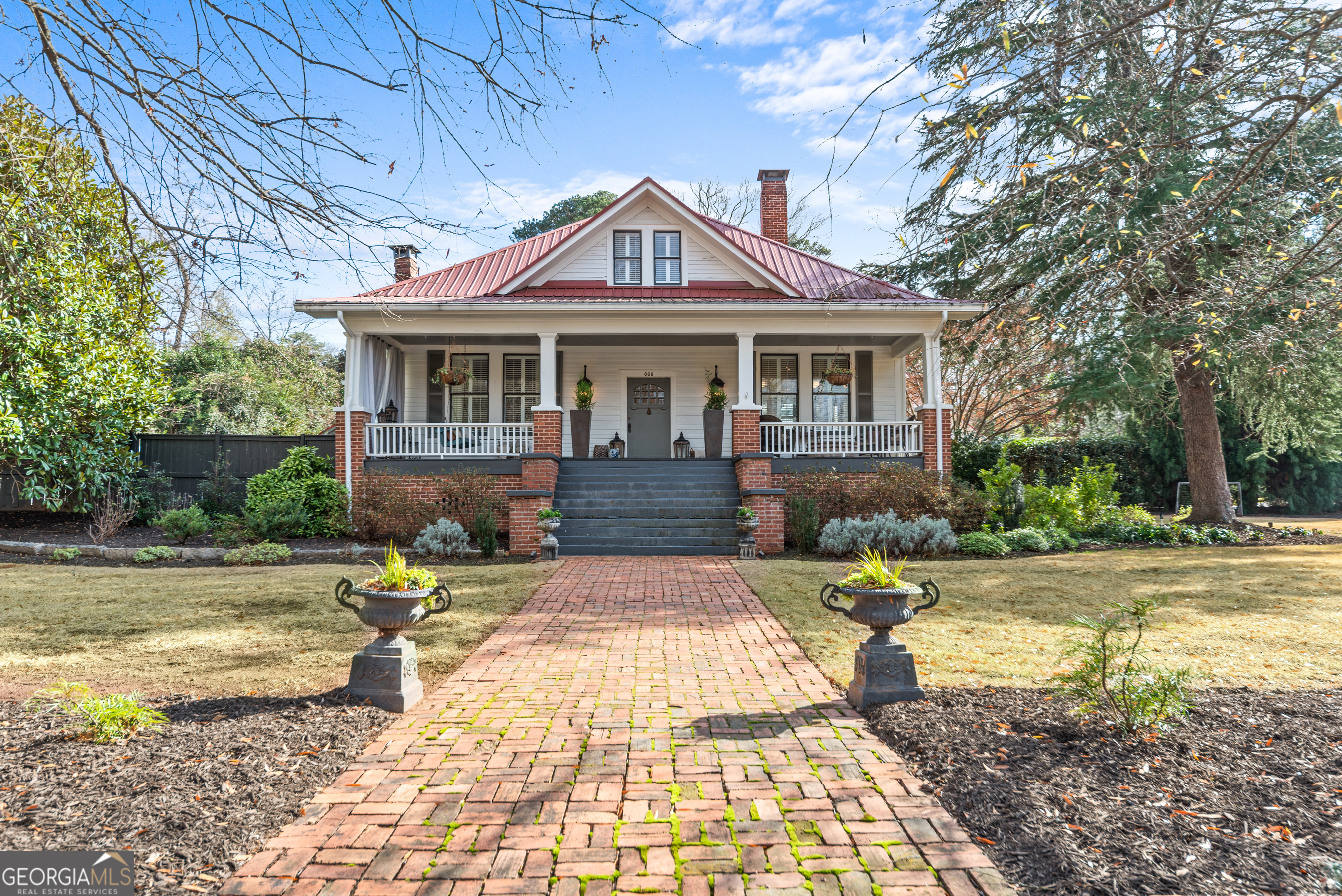 a front view of a house with swimming pool