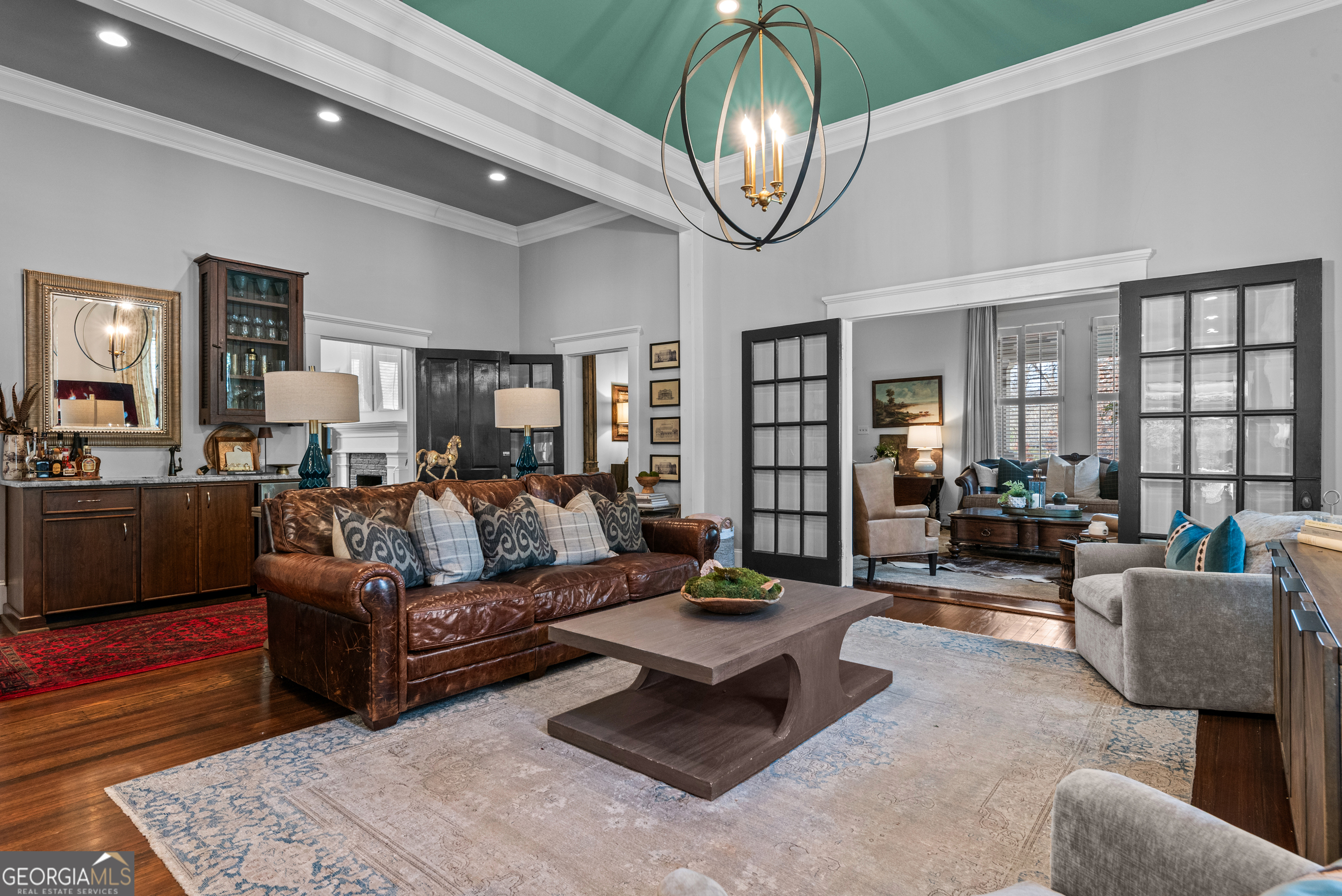 668 North Main Street Madison, GA 30650 - Photo 14 of 88 a living room with furniture chandelier and a rug