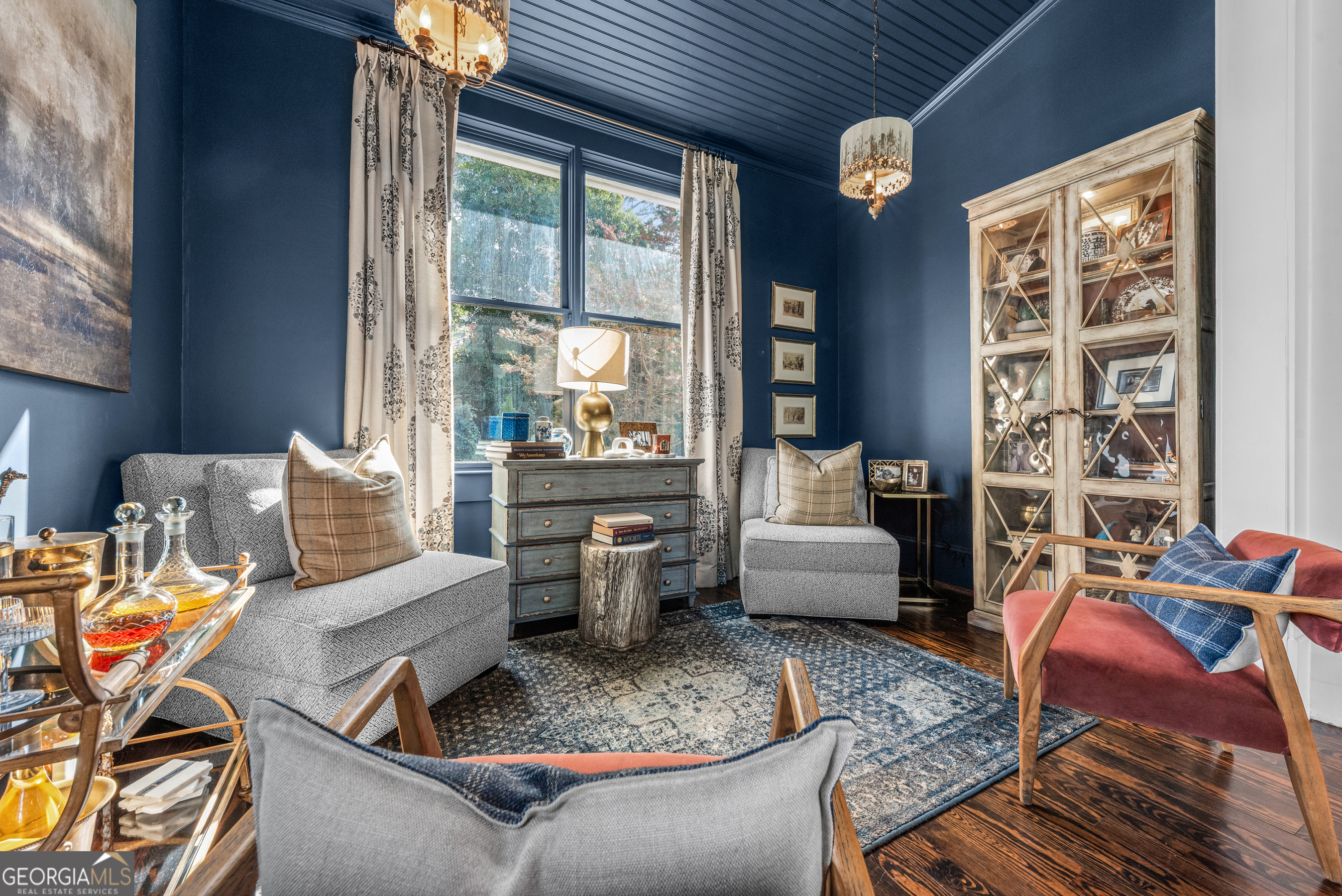 668 North Main Street Madison, GA 30650 - Photo 27 of 88 a living room with furniture and a large window