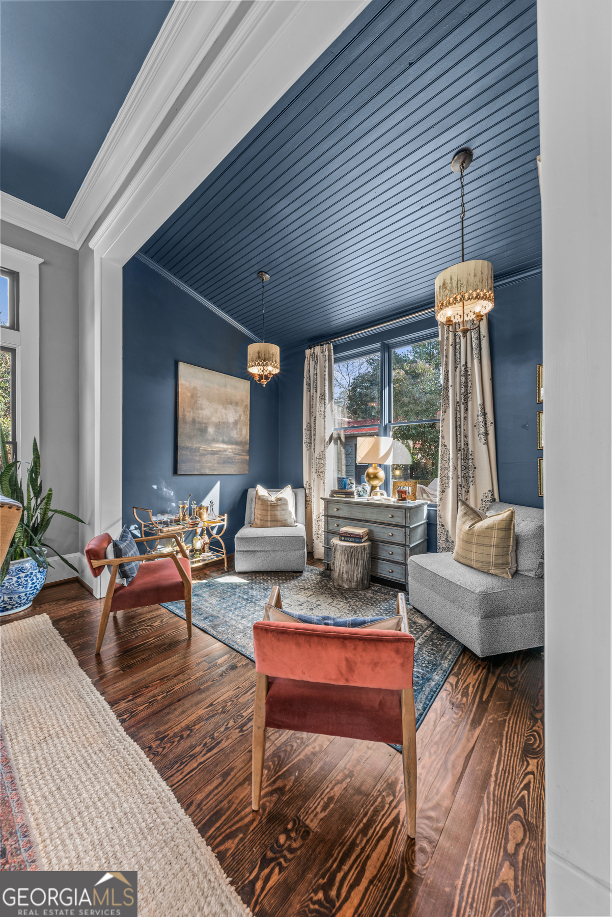 668 North Main Street Madison, GA 30650 - Photo 28 of 88 a living room with furniture and a chandelier