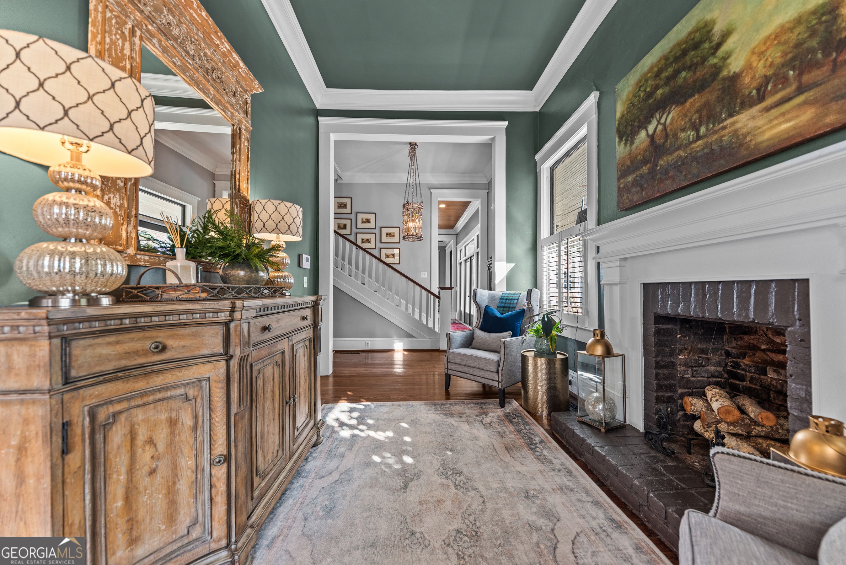 668 North Main Street Madison, GA 30650 - Photo 40 of 88 a living room with furniture and a fireplace