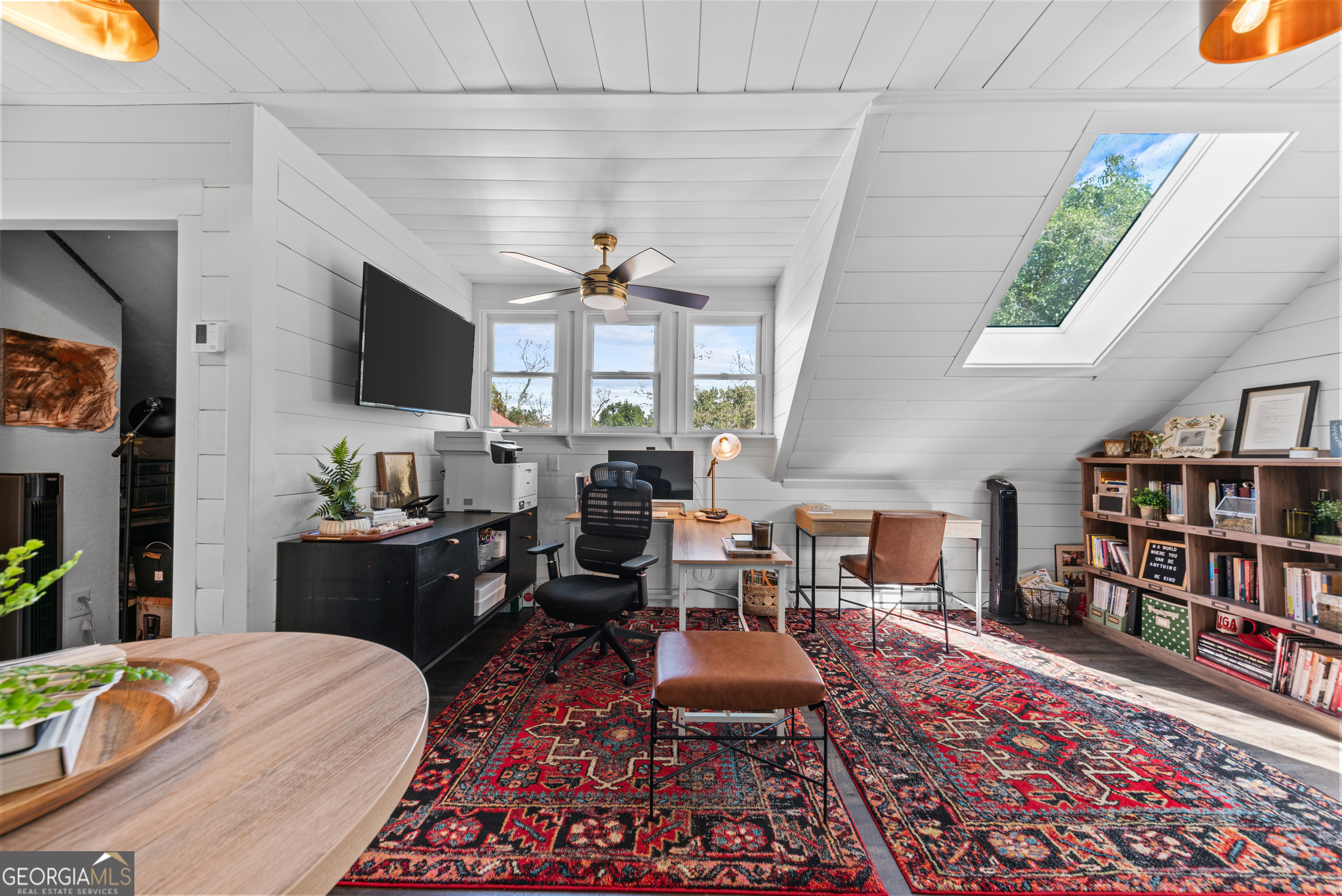 668 North Main Street Madison, GA 30650 - Photo 56 of 88 a living room with furniture and a flat screen tv