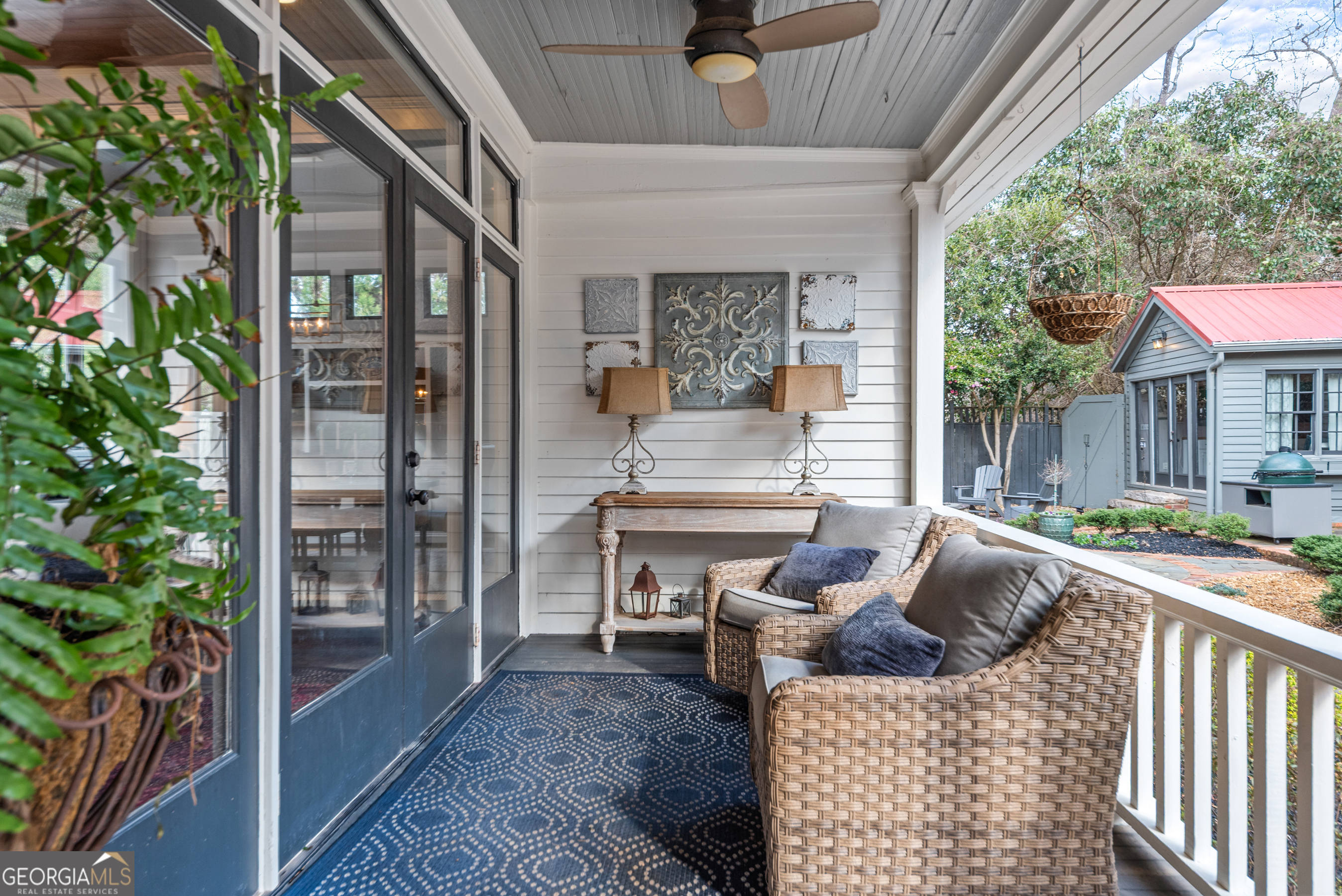 668 North Main Street Madison, GA 30650 - Photo 76 of 88 a balcony with furniture and a potted plant