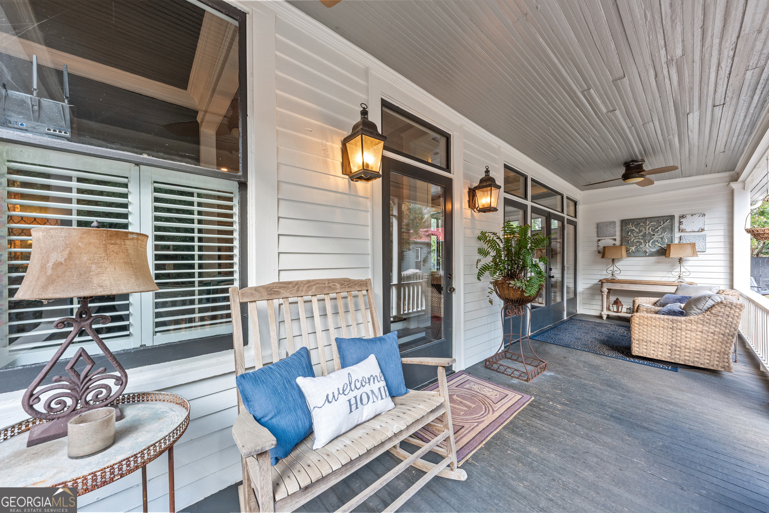 668 North Main Street Madison, GA 30650 - Photo 77 of 88 a outdoor living space with furniture and a potted plant