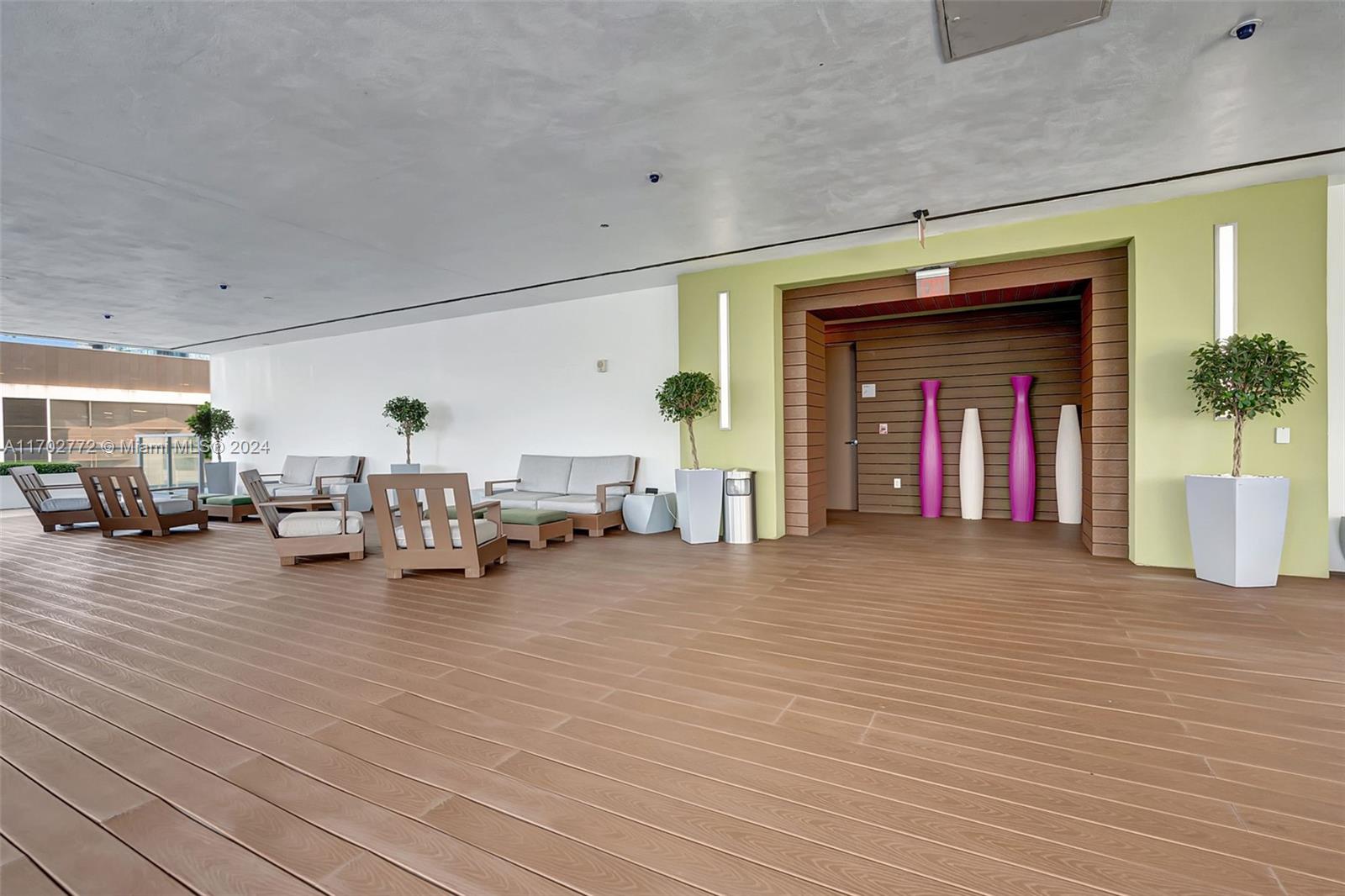 Brickell Miami, FL 33131 - Photo 39 of 52 a view of a livingroom with furniture and a ceiling fan