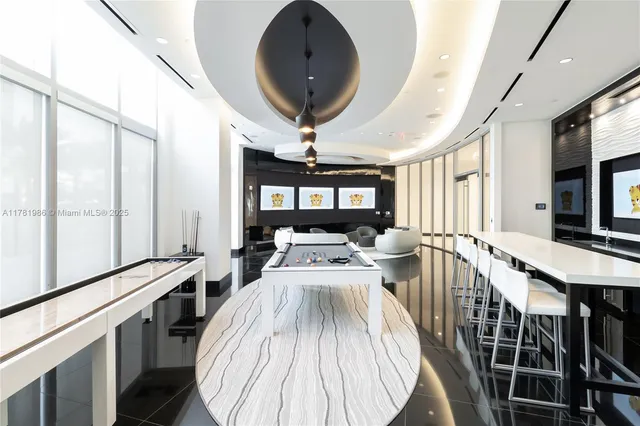 a view of a living room and dining room