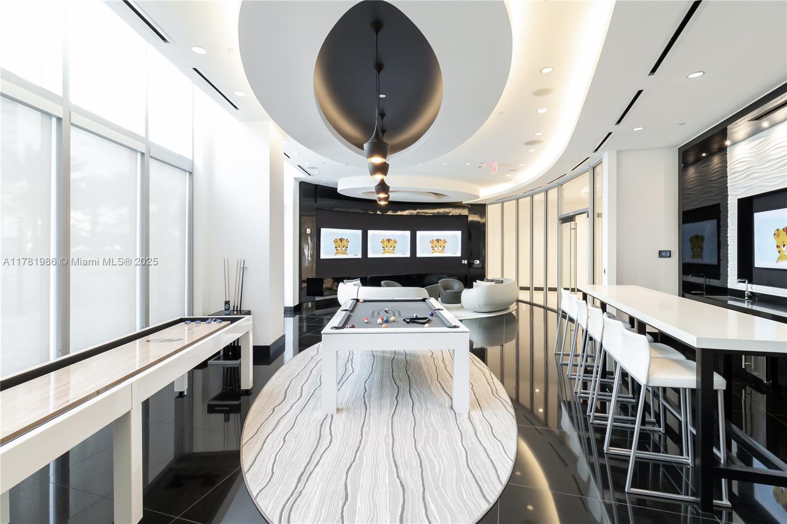 851 Northeast 1st Avenue, Unit 1102 Miami, FL 33132 - Photo 21 of 29 a view of a living room and dining room