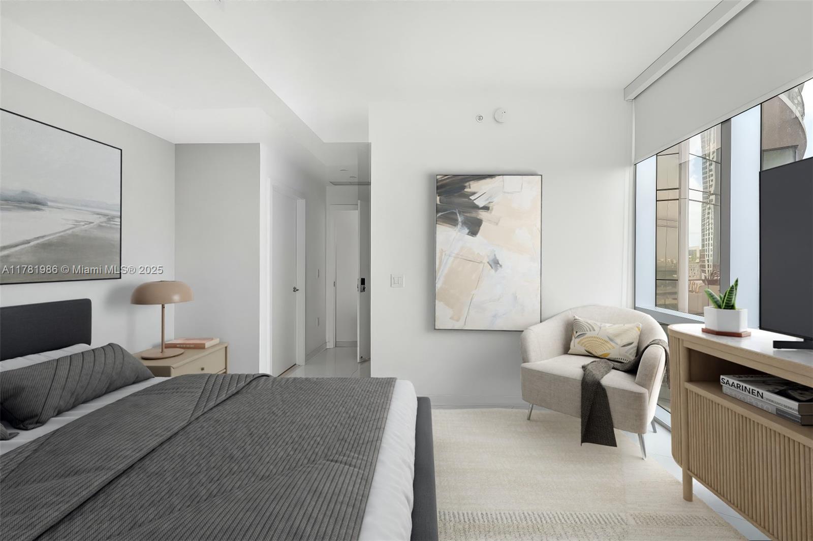 851 Northeast 1st Avenue, Unit 1102 Miami, FL 33132 - Photo 6 of 29 a bedroom with furniture and a large window