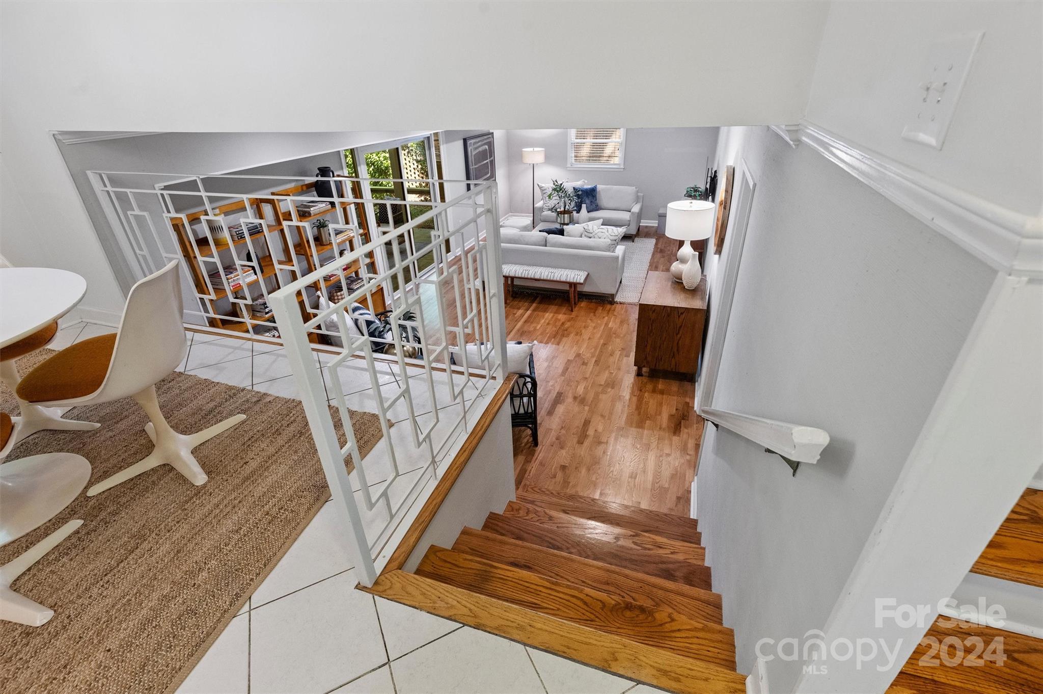 6810 Folger Drive Charlotte, NC 28270 - Photo 18 of 47 a view of entryway and hall with wooden floor