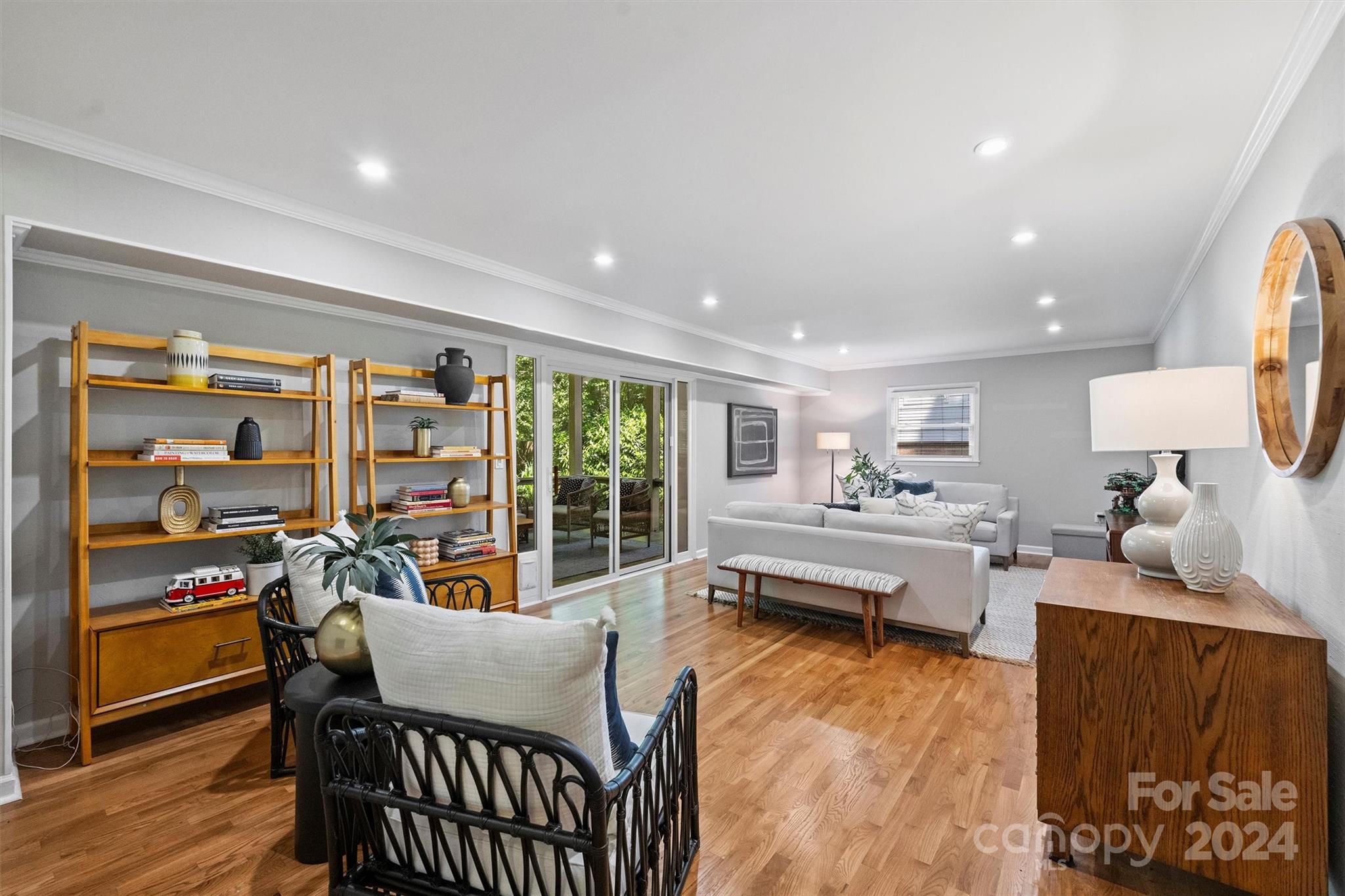 6810 Folger Drive Charlotte, NC 28270 - Photo 19 of 47 a living room with furniture and a large window