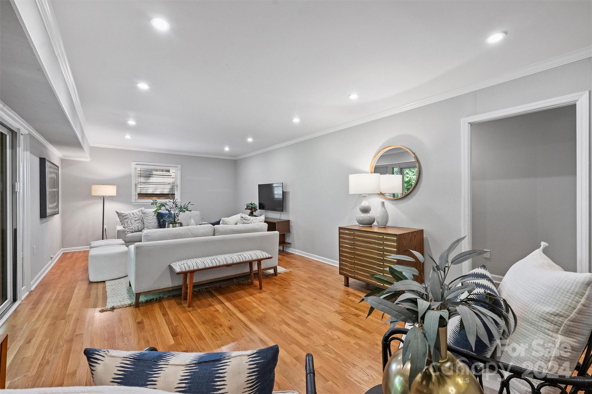 6810 Folger Drive Charlotte, NC 28270 - Photo 20 of 47 a living room with furniture and a wooden floor