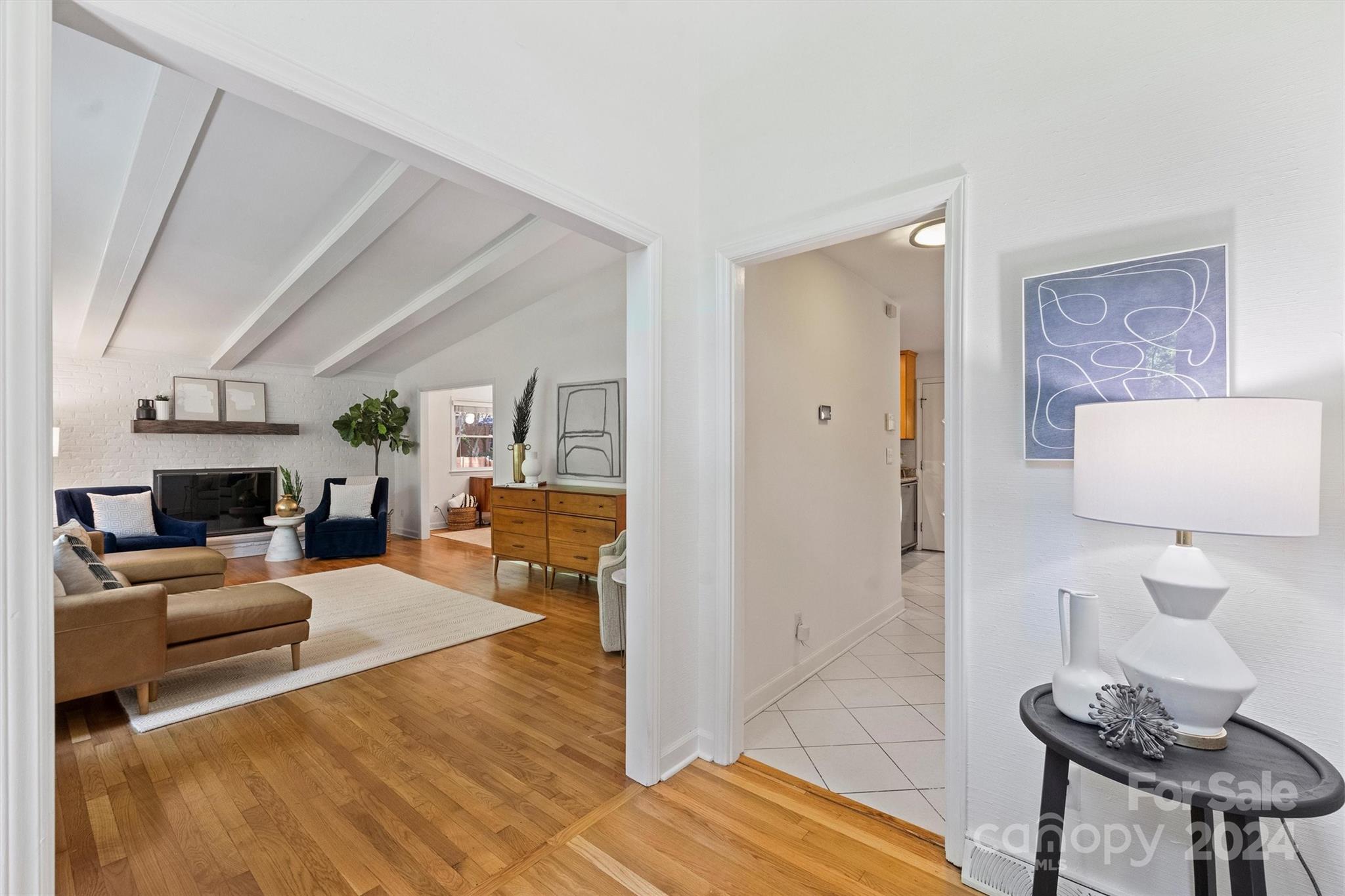 6810 Folger Drive Charlotte, NC 28270 - Photo 3 of 47 a living room with furniture and a fireplace
