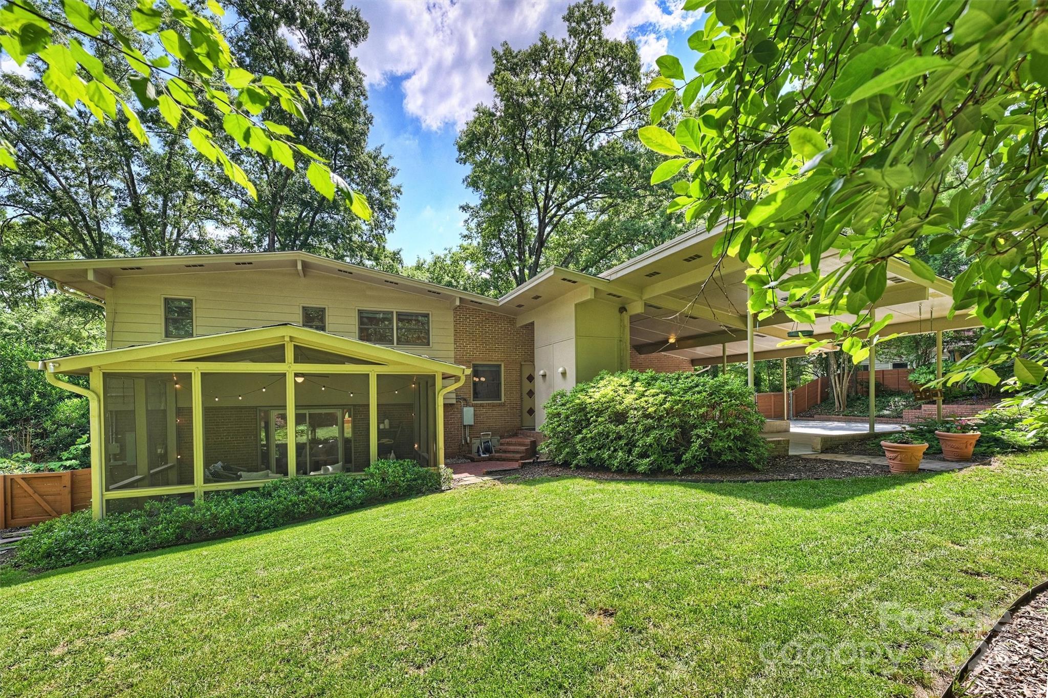 6810 Folger Drive Charlotte, NC 28270 - Photo 36 of 47 front view of a house with a yard