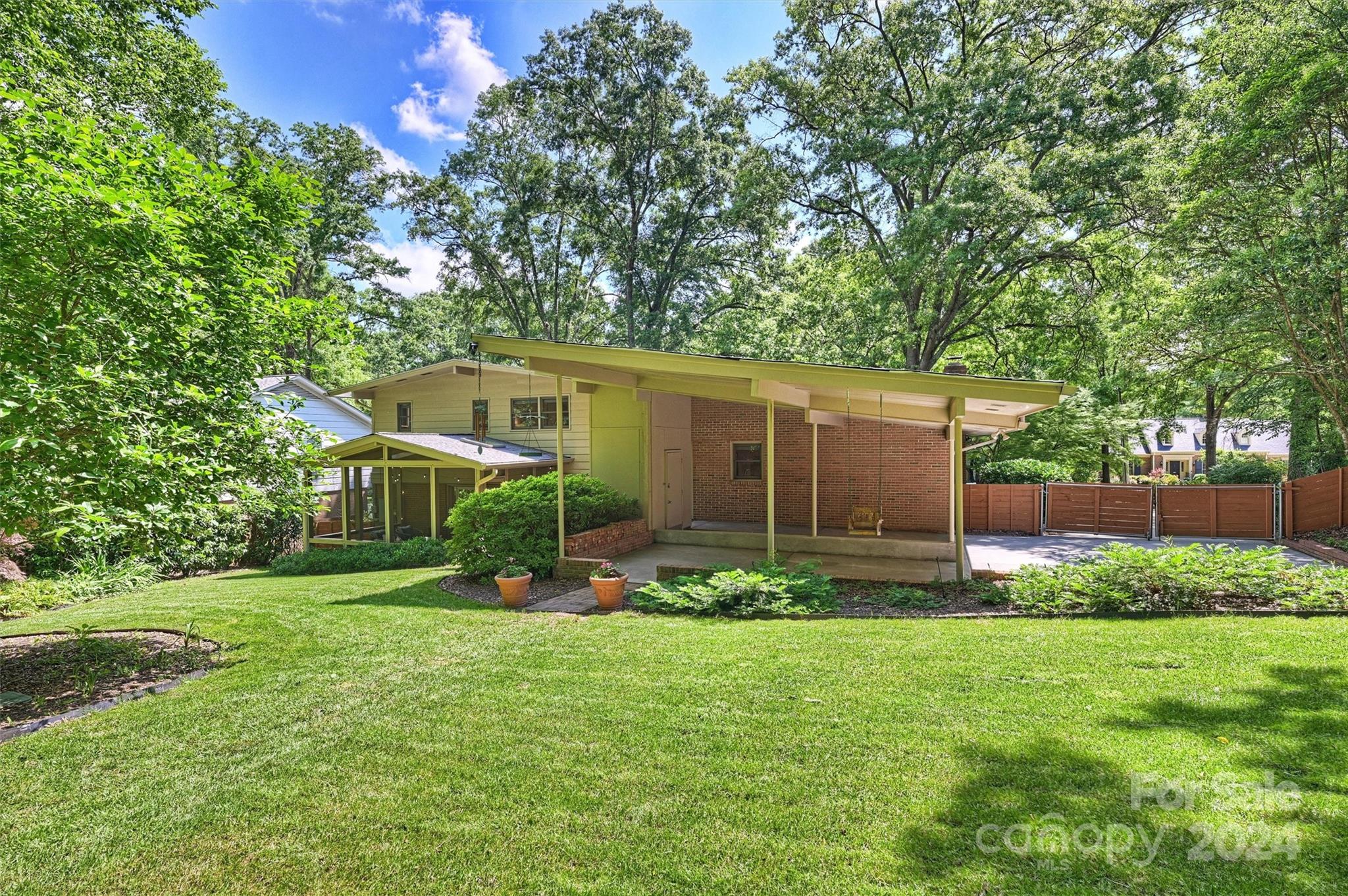 6810 Folger Drive Charlotte, NC 28270 - Photo 37 of 47 front view of a house with a yard