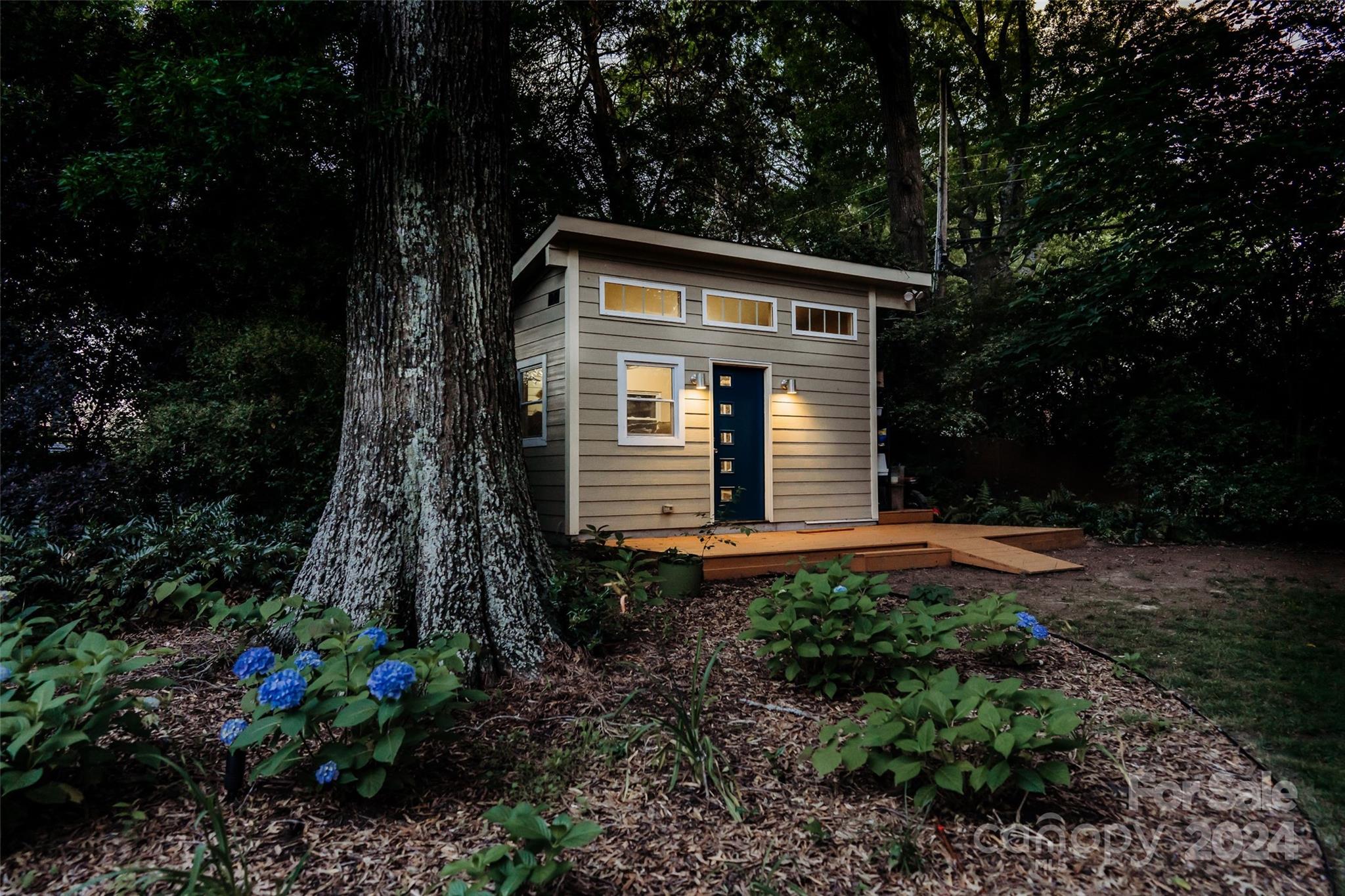 6810 Folger Drive Charlotte, NC 28270 - Photo 41 of 47 a front view of house with yard and green space