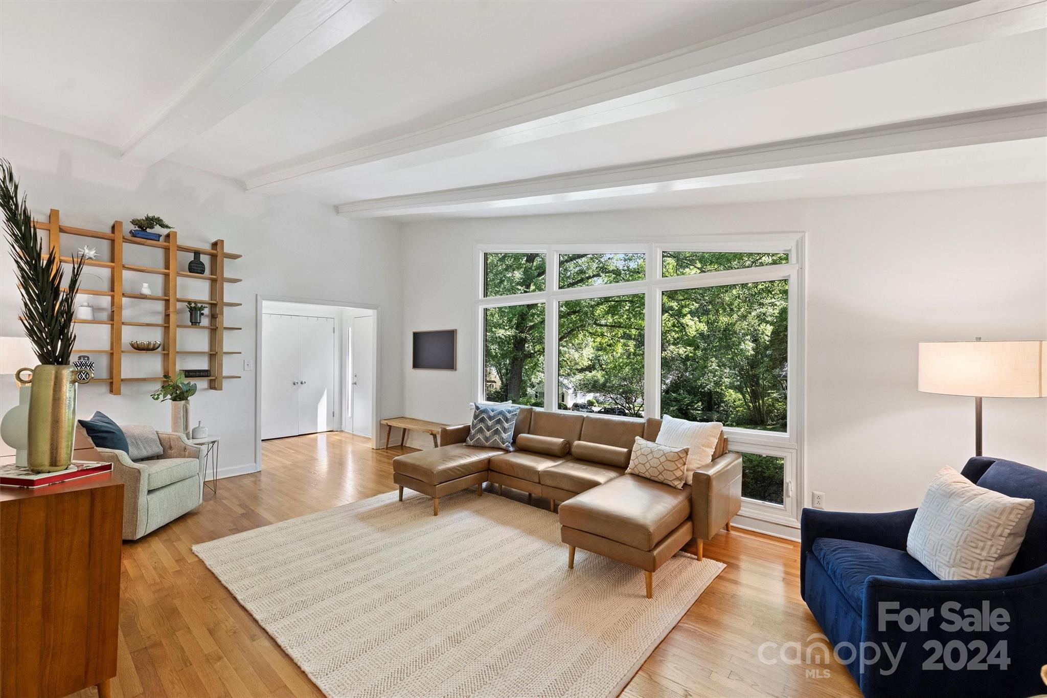 6810 Folger Drive Charlotte, NC 28270 - Photo 7 of 47 a living room with furniture and a large window