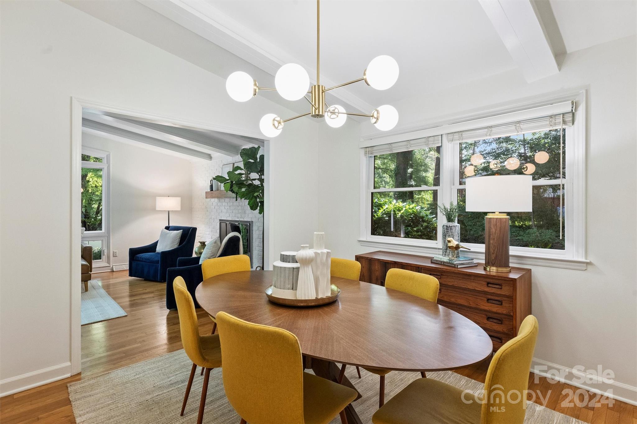 6810 Folger Drive Charlotte, NC 28270 - Photo 9 of 47 a view of a dining room with furniture window and wooden floor