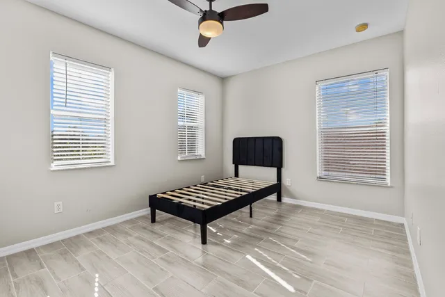 a view of room with stairs and windows