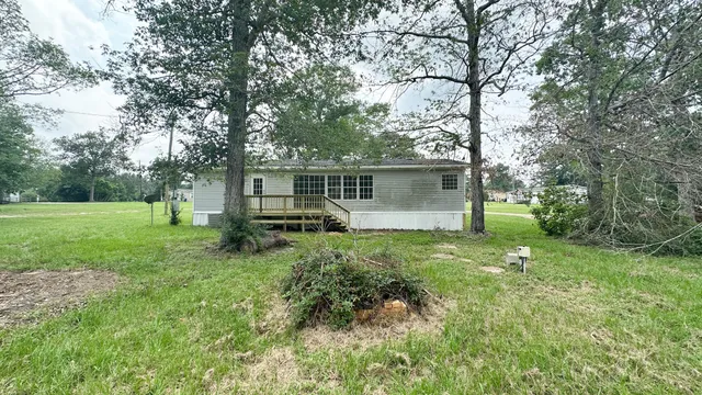 a house view with a garden space