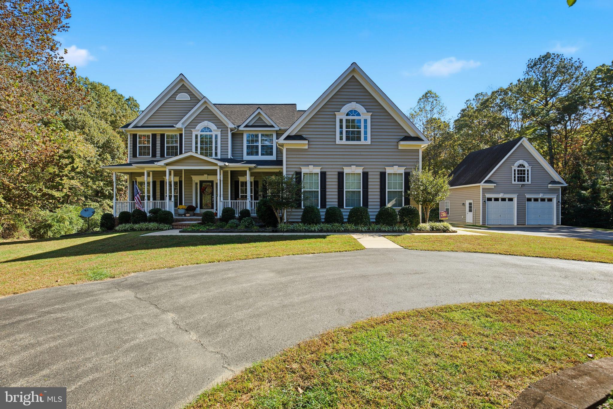 a view of house with swimming pool and view of house