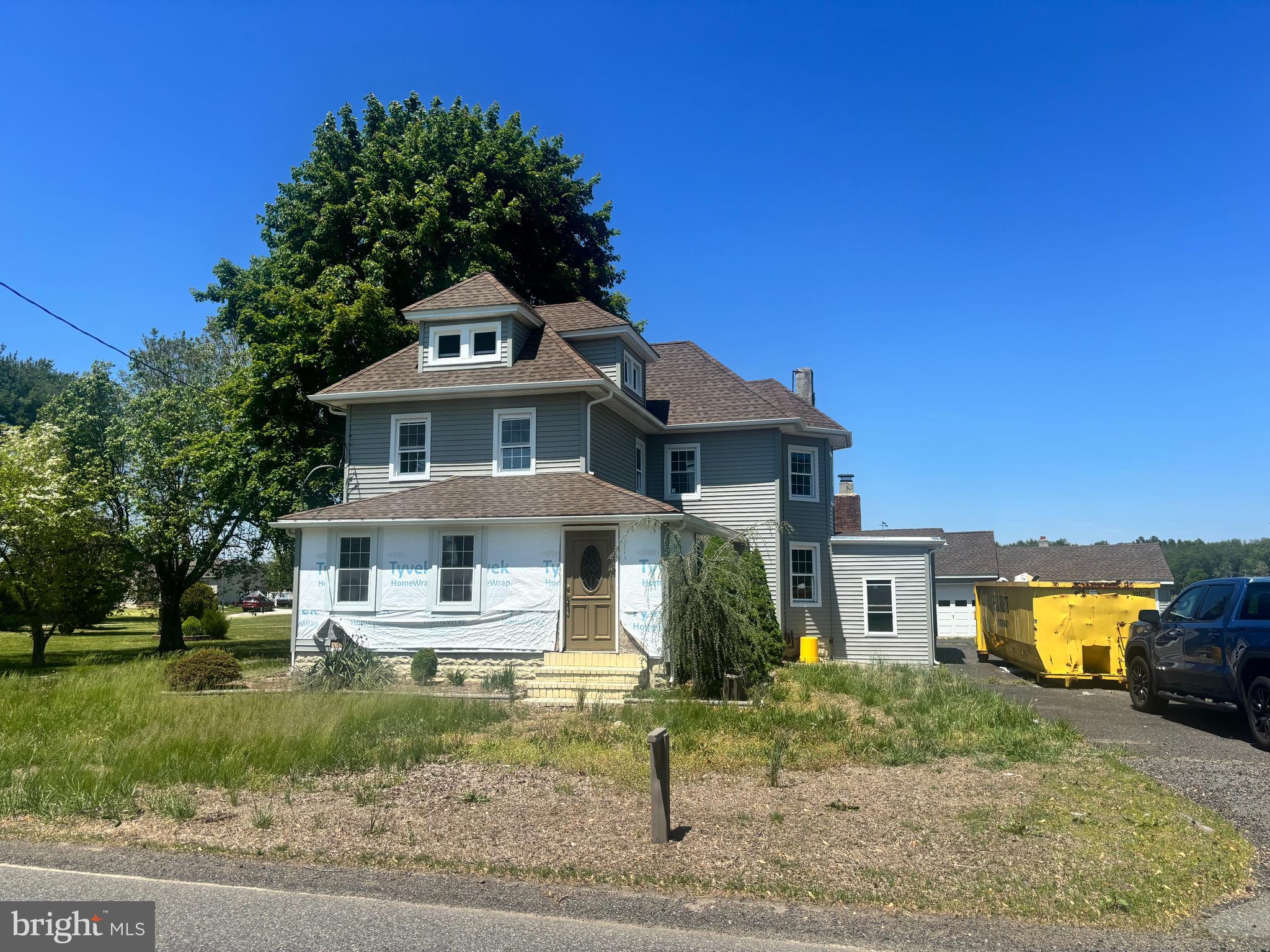 219 Pump Branch Road Waterford Works, NJ 08089 - Photo 1 of 35 a front view of a house with a yard