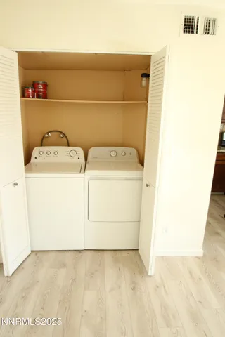 a view of a small yard from a balcony