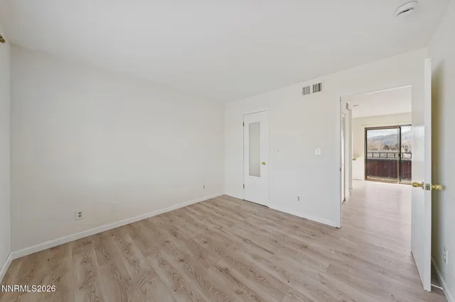 an aerial view of residential house with outdoor space and swimming pool
