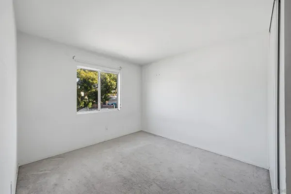 a view of an empty room and window