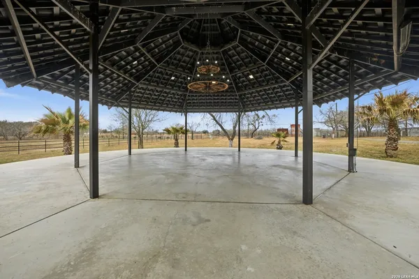 a view of a swimming pool with a porch
