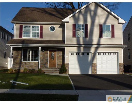 415 Putnam Road Union, NJ 07083 - Photo 1 of 1 a front view of a house with a yard