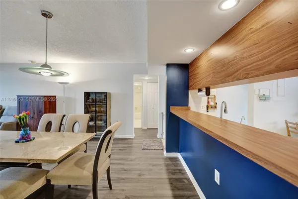 a view of a dining room with furniture