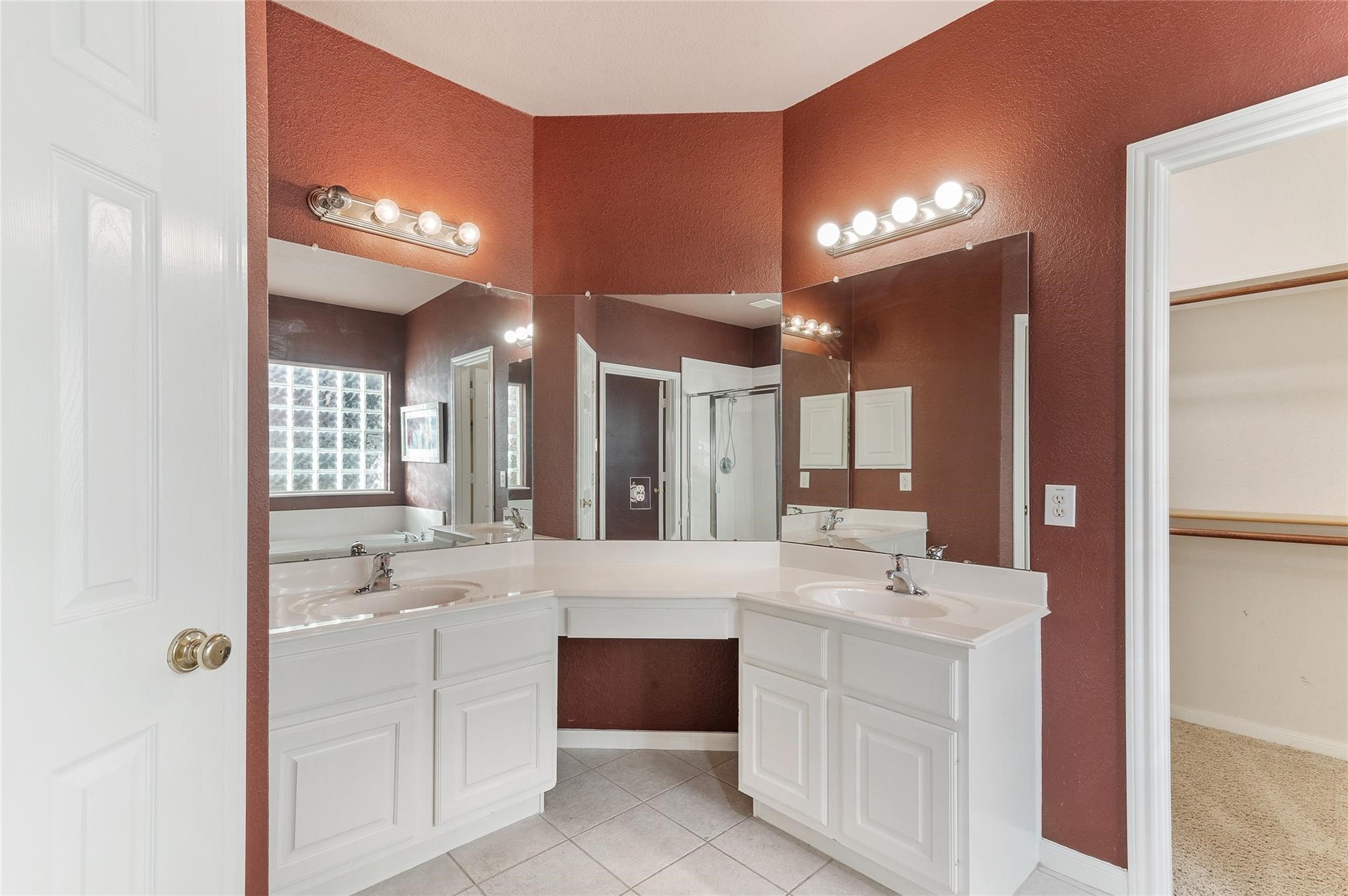 4302 Country Oaks Court Spring, TX 77388 - Photo 15 of 25 a spacious bathroom with a sink a large mirror and a shower