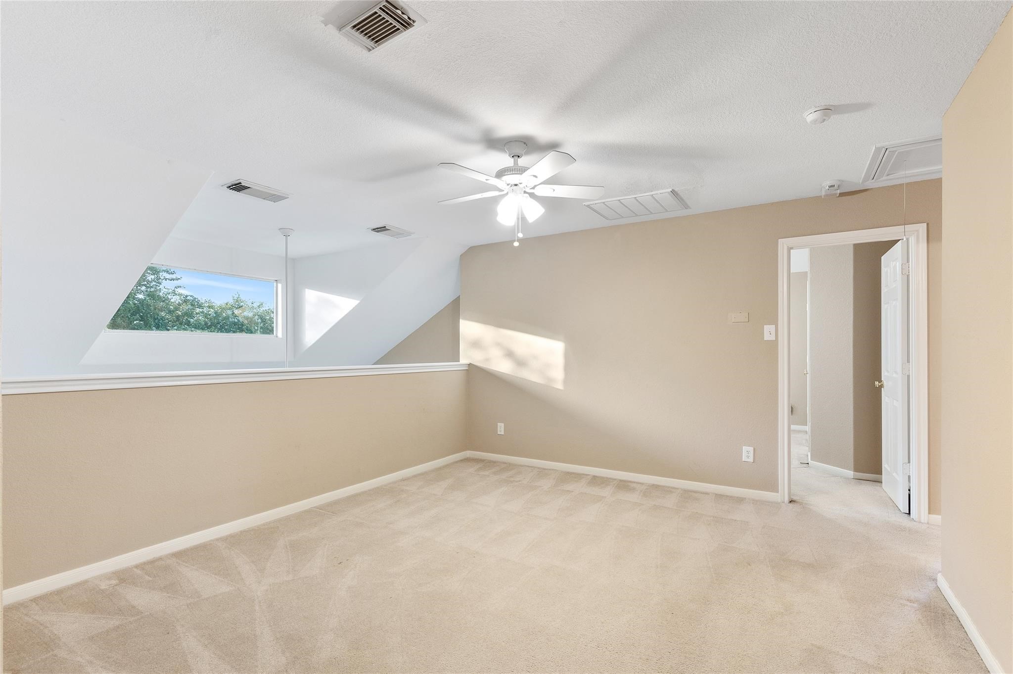 4302 Country Oaks Court Spring, TX 77388 - Photo 18 of 25 a view of an empty room with a window