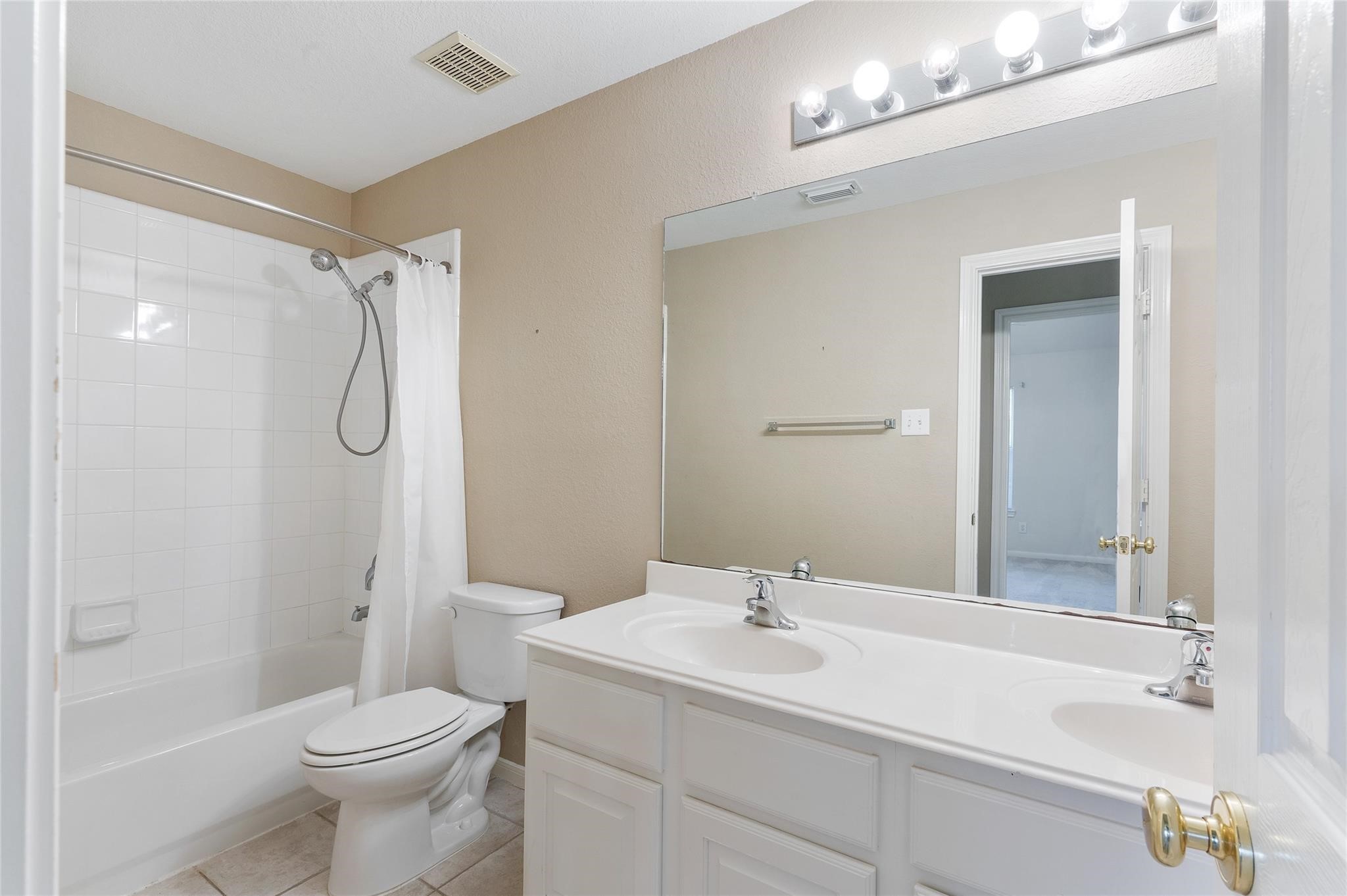 4302 Country Oaks Court Spring, TX 77388 - Photo 22 of 25 a bathroom with a sink a toilet and shower