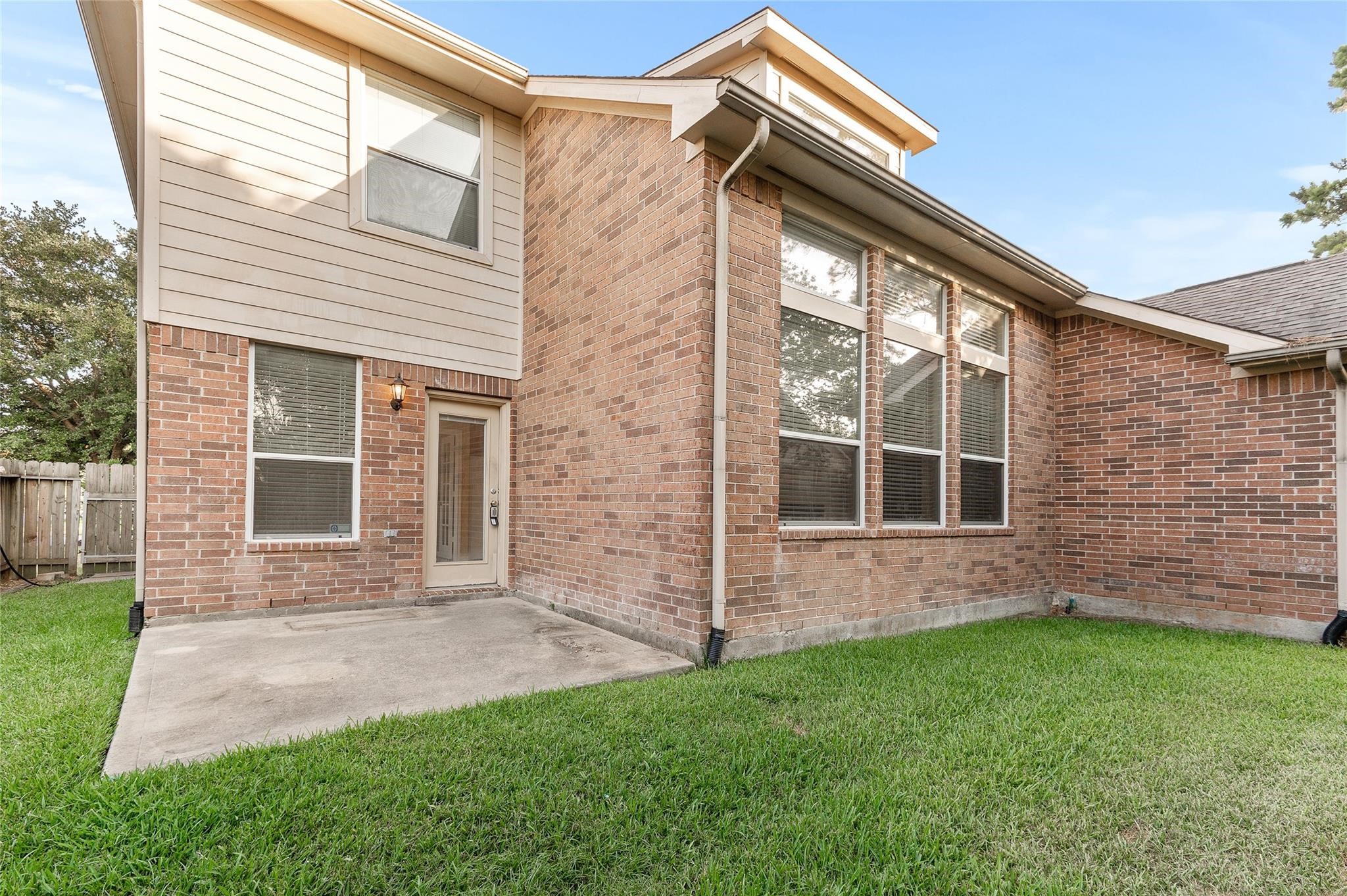 4302 Country Oaks Court Spring, TX 77388 - Photo 24 of 25 a front view of a house with a yard
