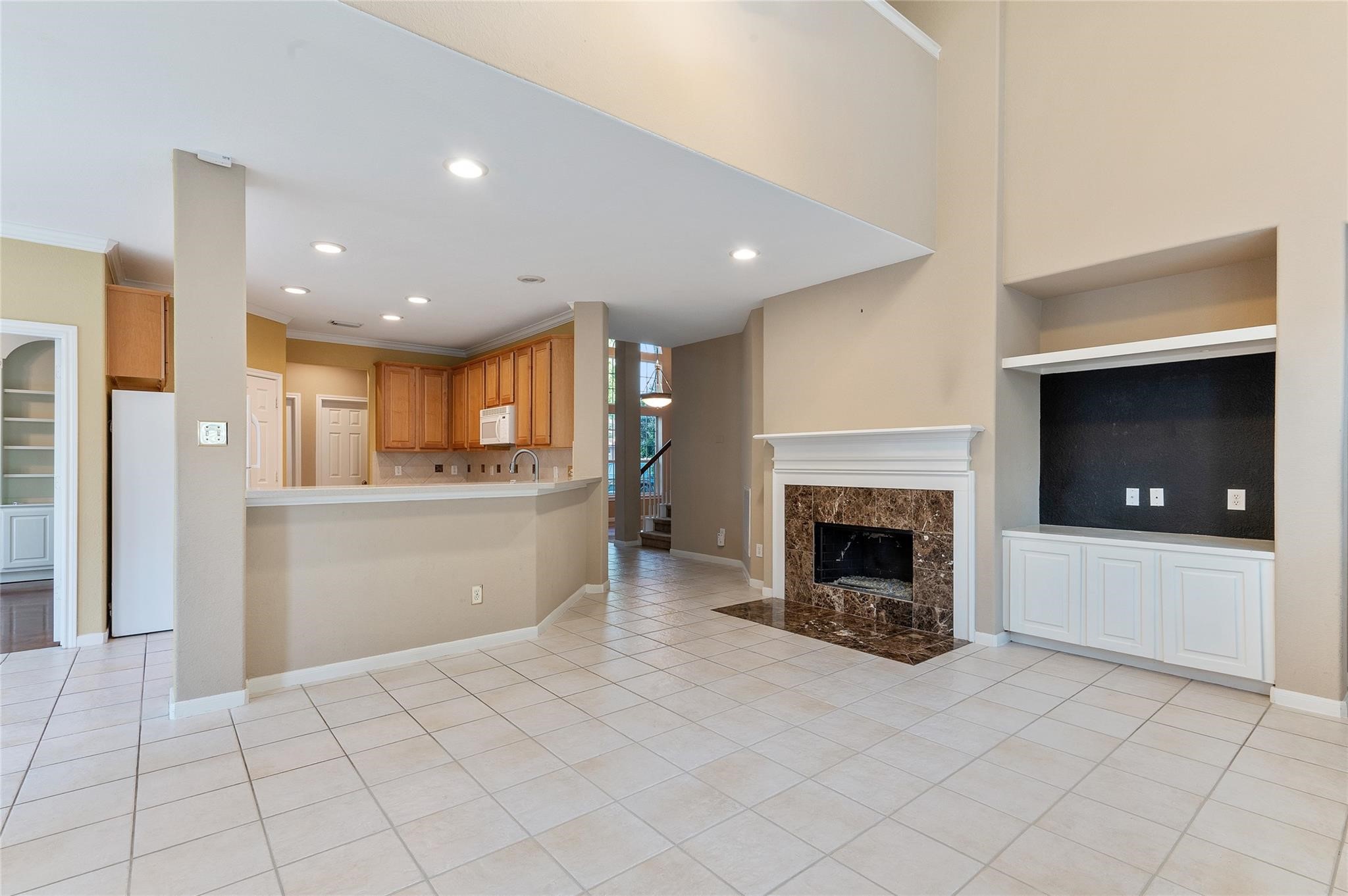 4302 Country Oaks Court Spring, TX 77388 - Photo 5 of 25 a view of a livingroom with a fireplace and window