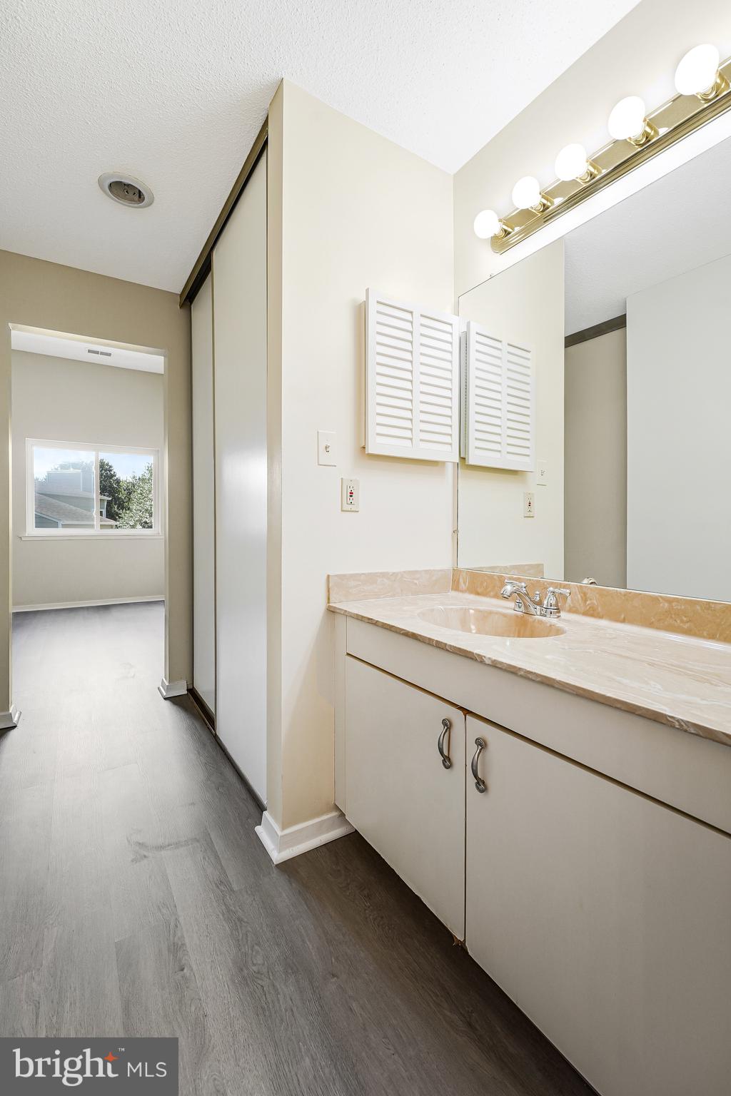 1964 Villaridge Drive Reston, VA 20191 - Photo 21 of 27 a bathroom with a sink and a mirror