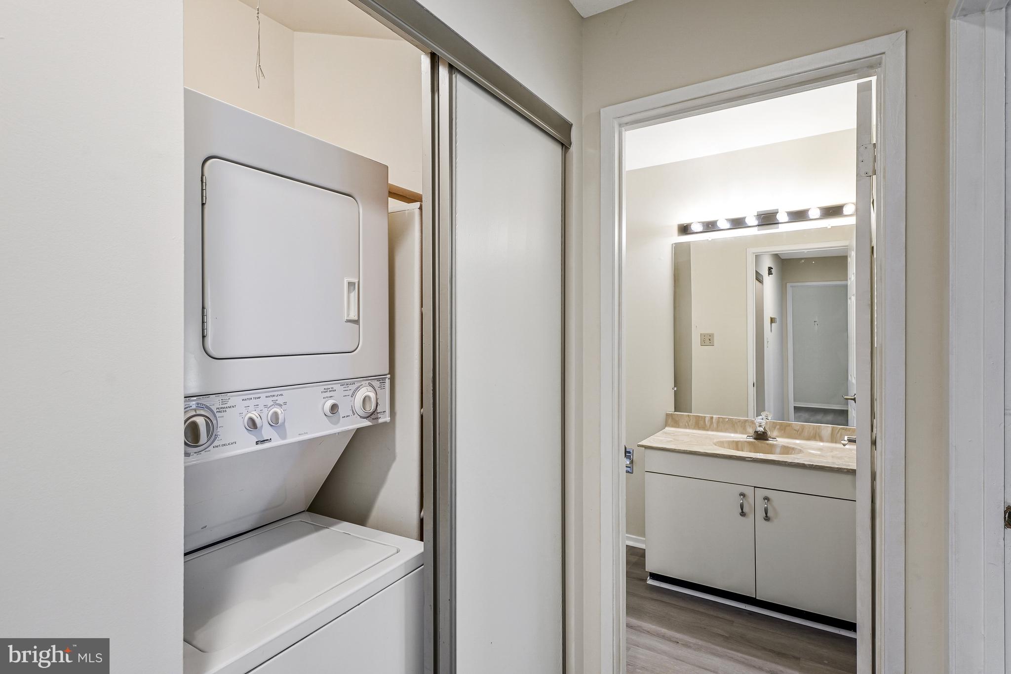 1964 Villaridge Drive Reston, VA 20191 - Photo 24 of 27 a bathroom with a toilet sink and mirror