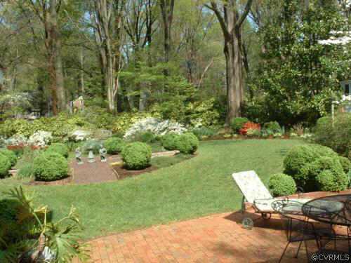 7606 Cheshire Road Richmond, VA 23229 - Photo 5 of 5 a view of backyard with outdoor seating and green space