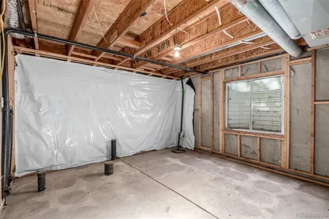 a view of a room with wooden walls