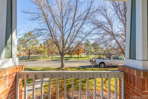 a view of yard with wooden fence