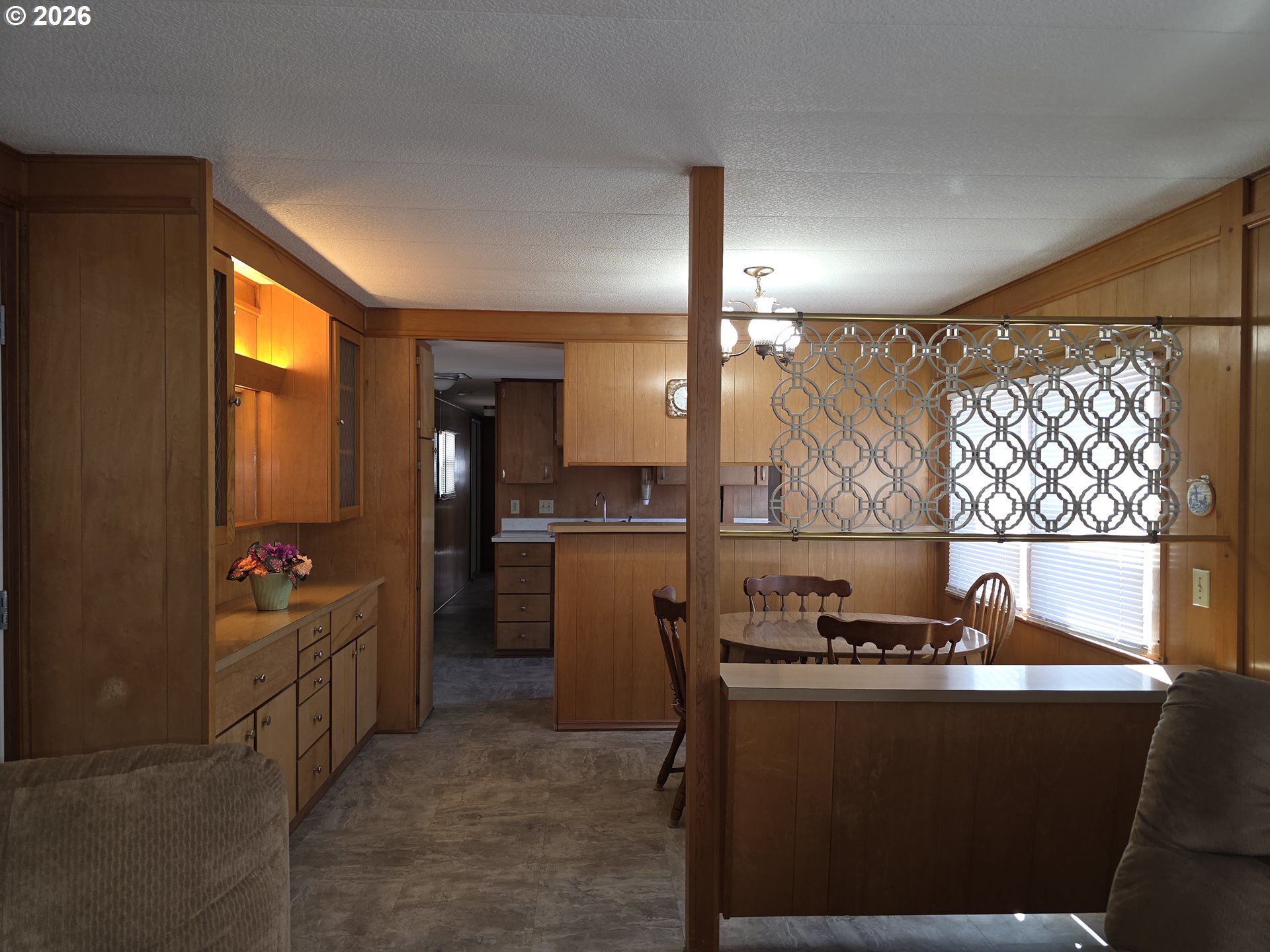 3203 Southeast Vineyard Road, Unit 44 Milwaukie, OR 97267 - Photo 11 of 38 a kitchen with sink and refrigerator