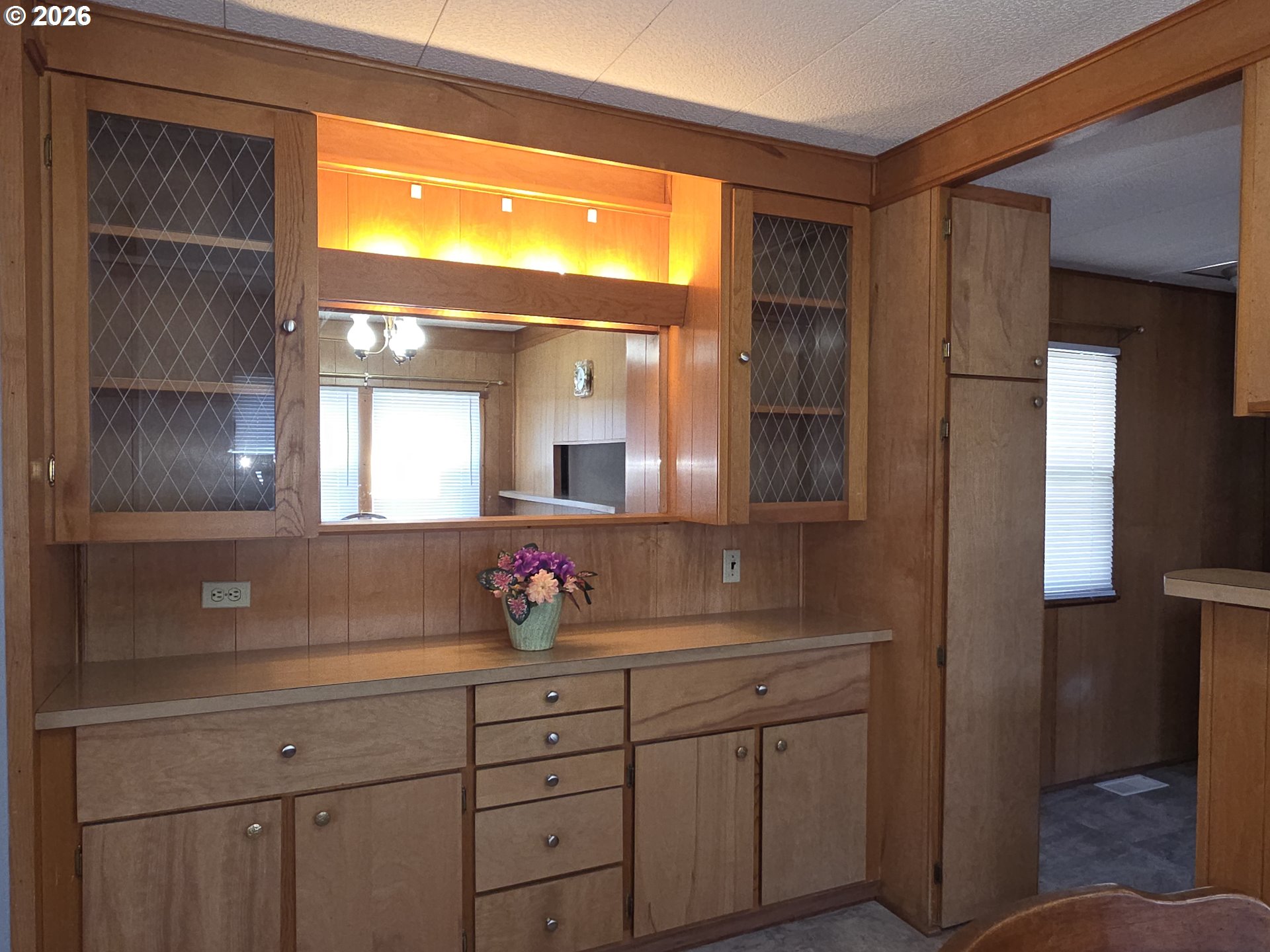 3203 Southeast Vineyard Road, Unit 44 Milwaukie, OR 97267 - Photo 13 of 38 a bathroom with a sink and a mirror